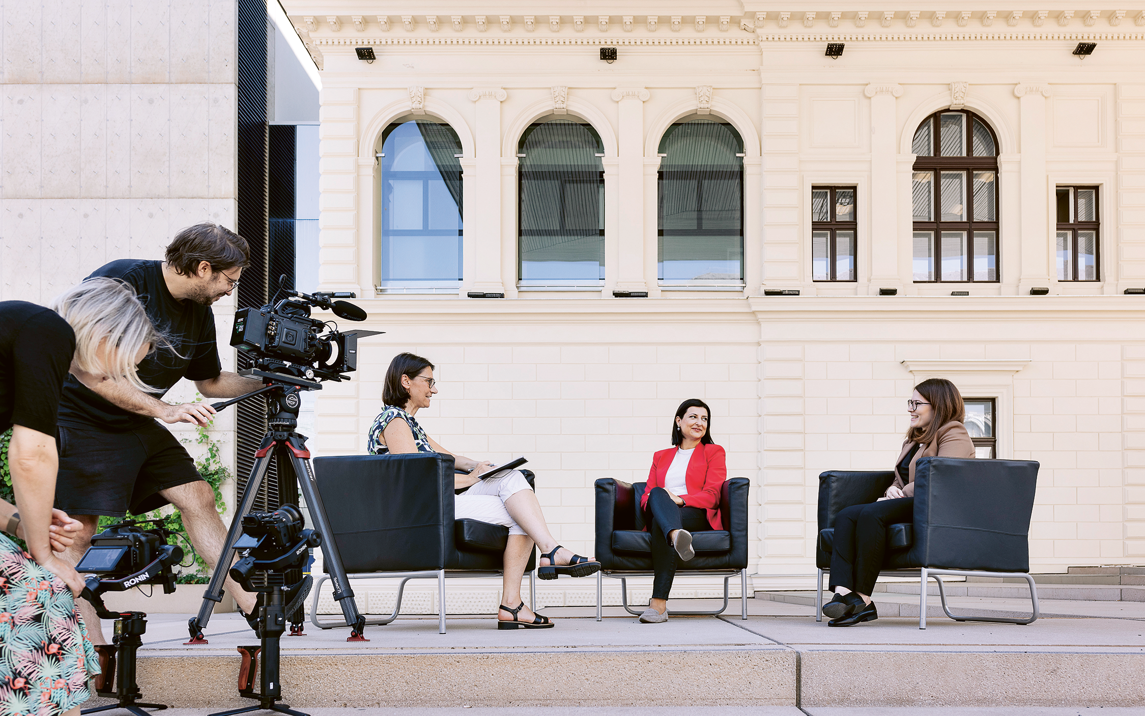 Nina and Lisa-Marie talking in front of the UB